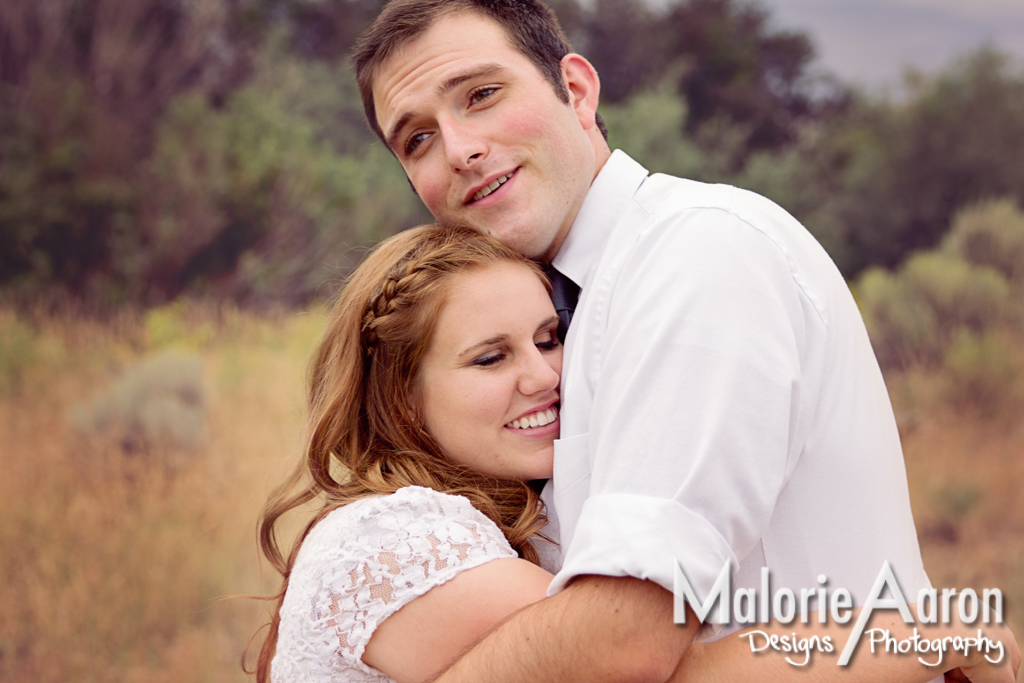 MalorieAaron, photography, quadCities, Davenport, engagement, portraits, river, romantic, couple